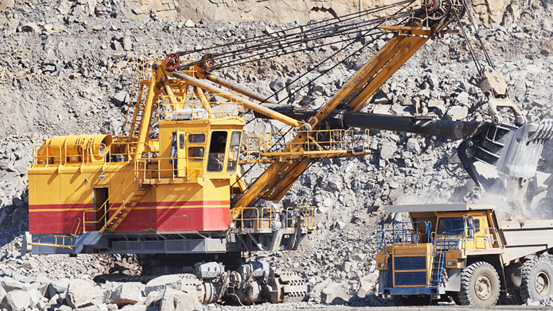 Excavator Breaking Large Rocks On A Construction Site Png