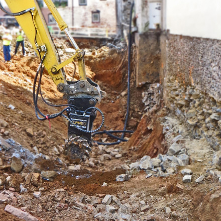 Bedrock Excavation with Adjacent Sensitive Structures