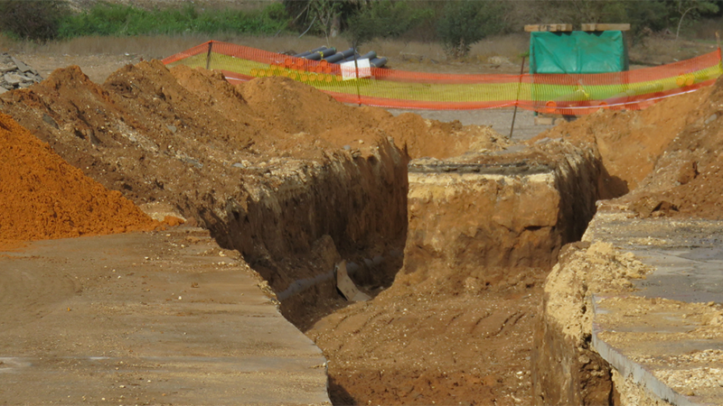 A Deep Freshly Dug Trench On A Construction Site Png